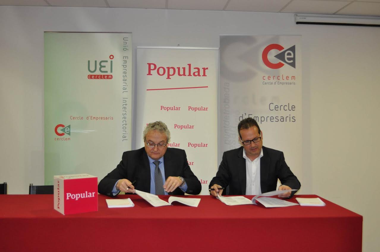 Berenguer Galí (Banc Popular) i Joaquim Colom (UEI-Cerclem) en la firma del conveni
