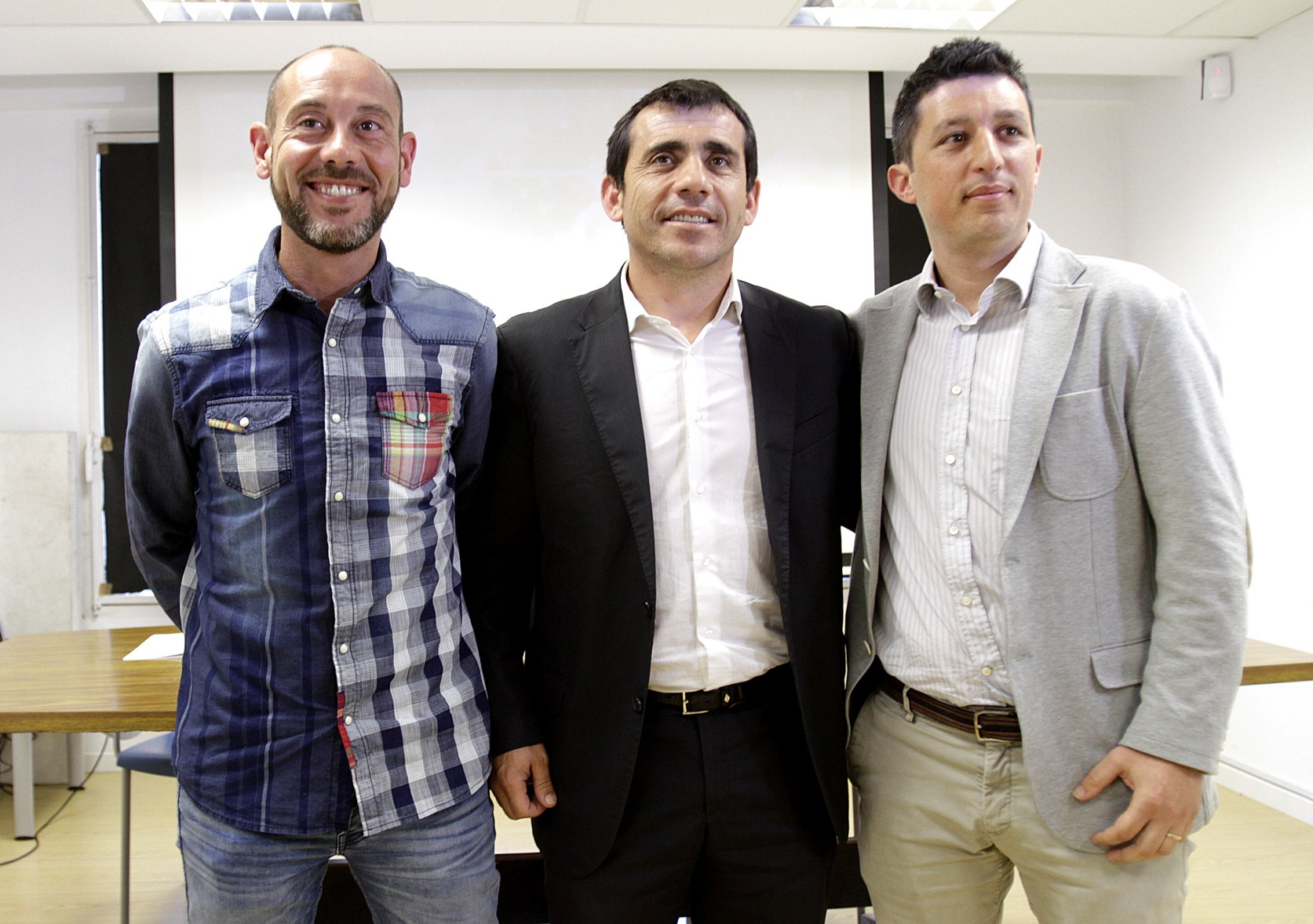 D'esquerra a dreta, Carlos Arean, nou director general de l'EC Granollers, Xavier Abolafio, president, i Nacho Guerrero, director de Nama Sports