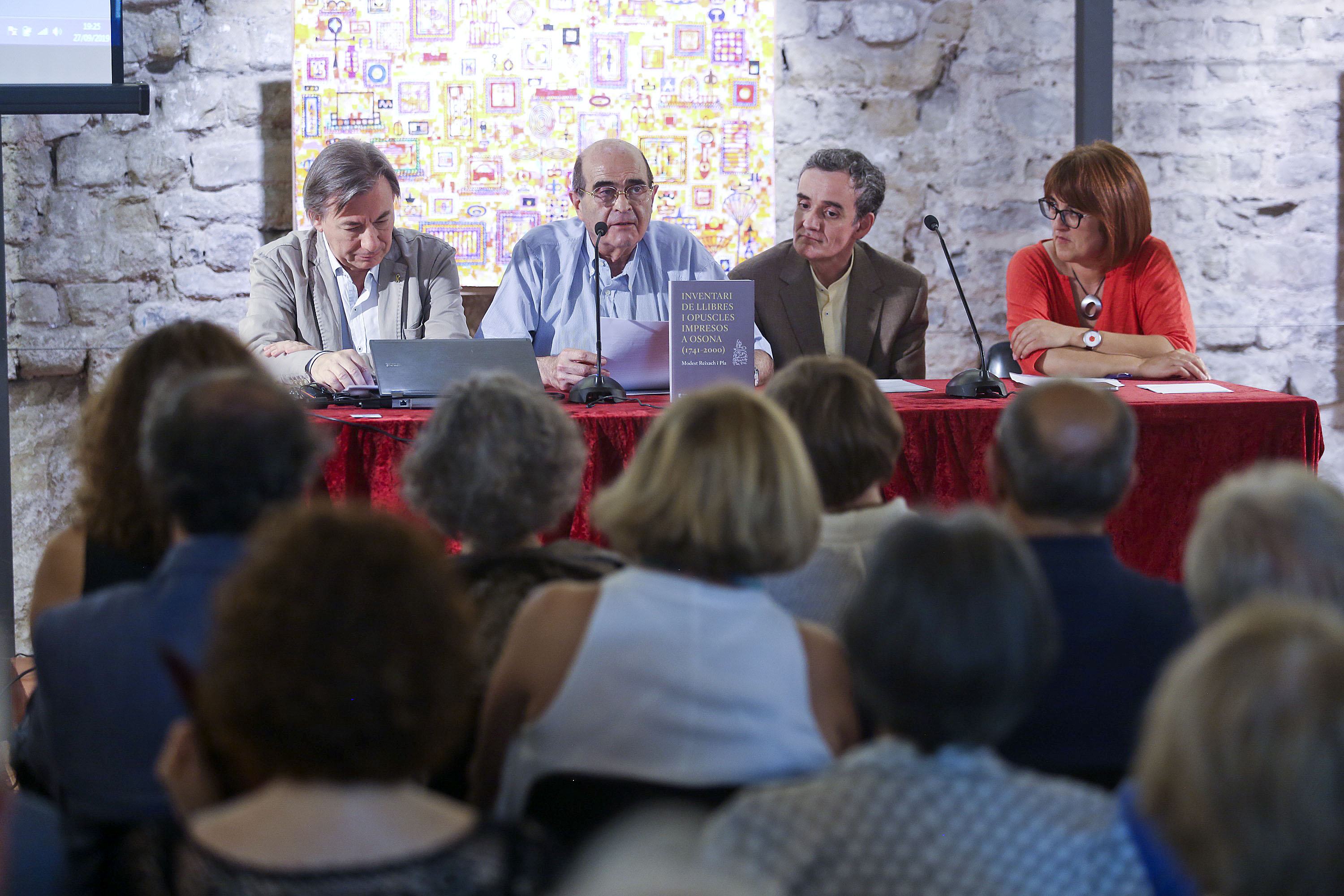 D’esquerra a dreta, Francesc Codina, Manuel Llanas, Eduard Botanch i l’editora d’Eumo, Montse Ayats, durant l’acte de divendres