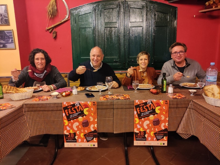 Montse Vila, Francesc Colomé, Sònia Tena i Joan Gallifa, durant l'acte de presentació